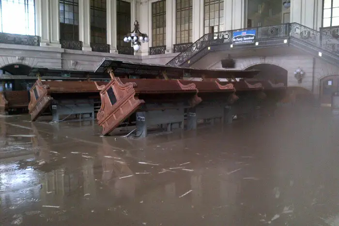 The Hoboken train terminal is overwhelmed with flooding after Hurricane Sandy hit New Jersey Sept. 29, 2012. Experts say the damage to NJ Transit spurred investment in resiliency, but more needs to be done.